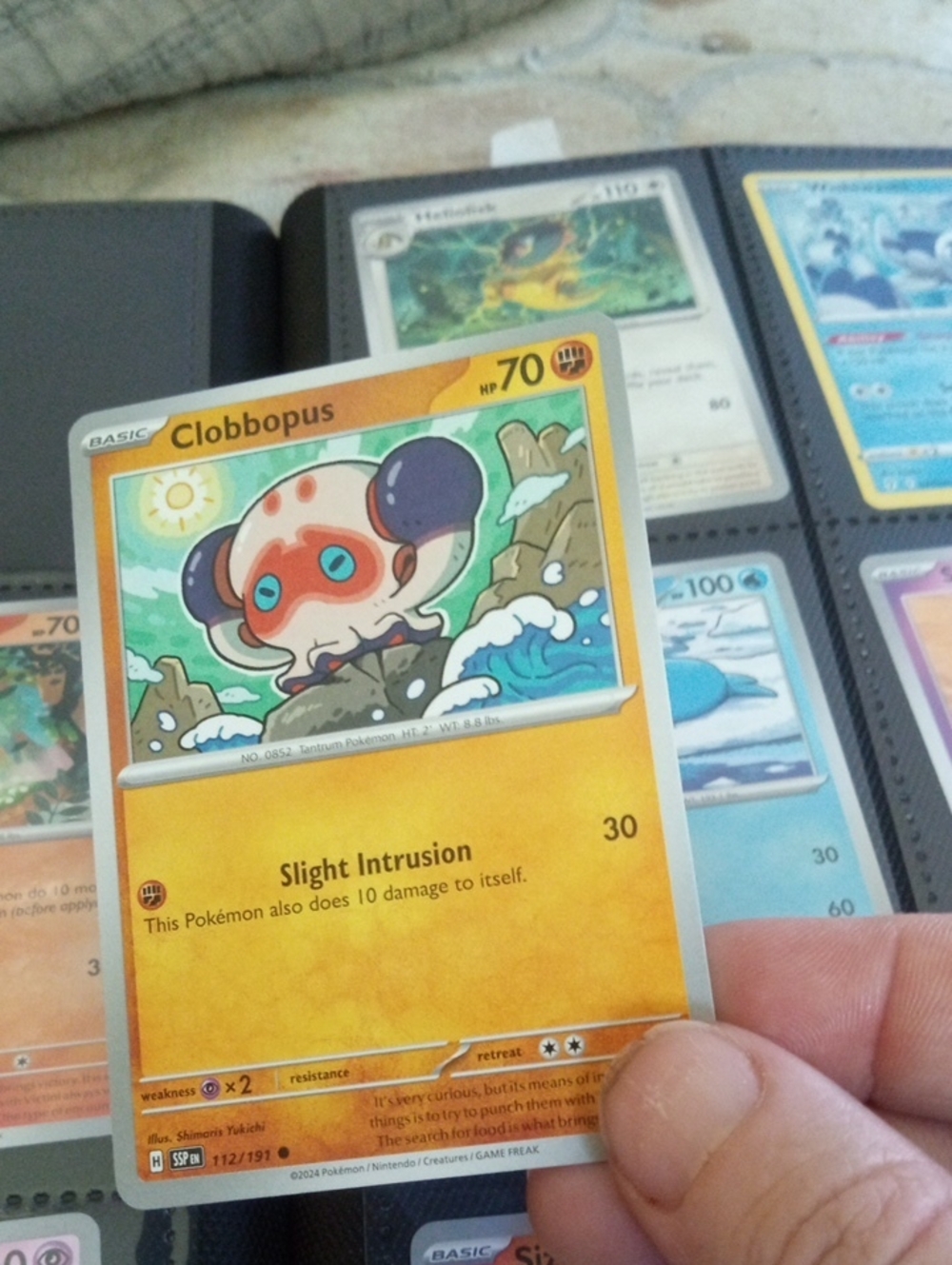 Pokemon Clobbopus Card - Yellow & Orange Accents